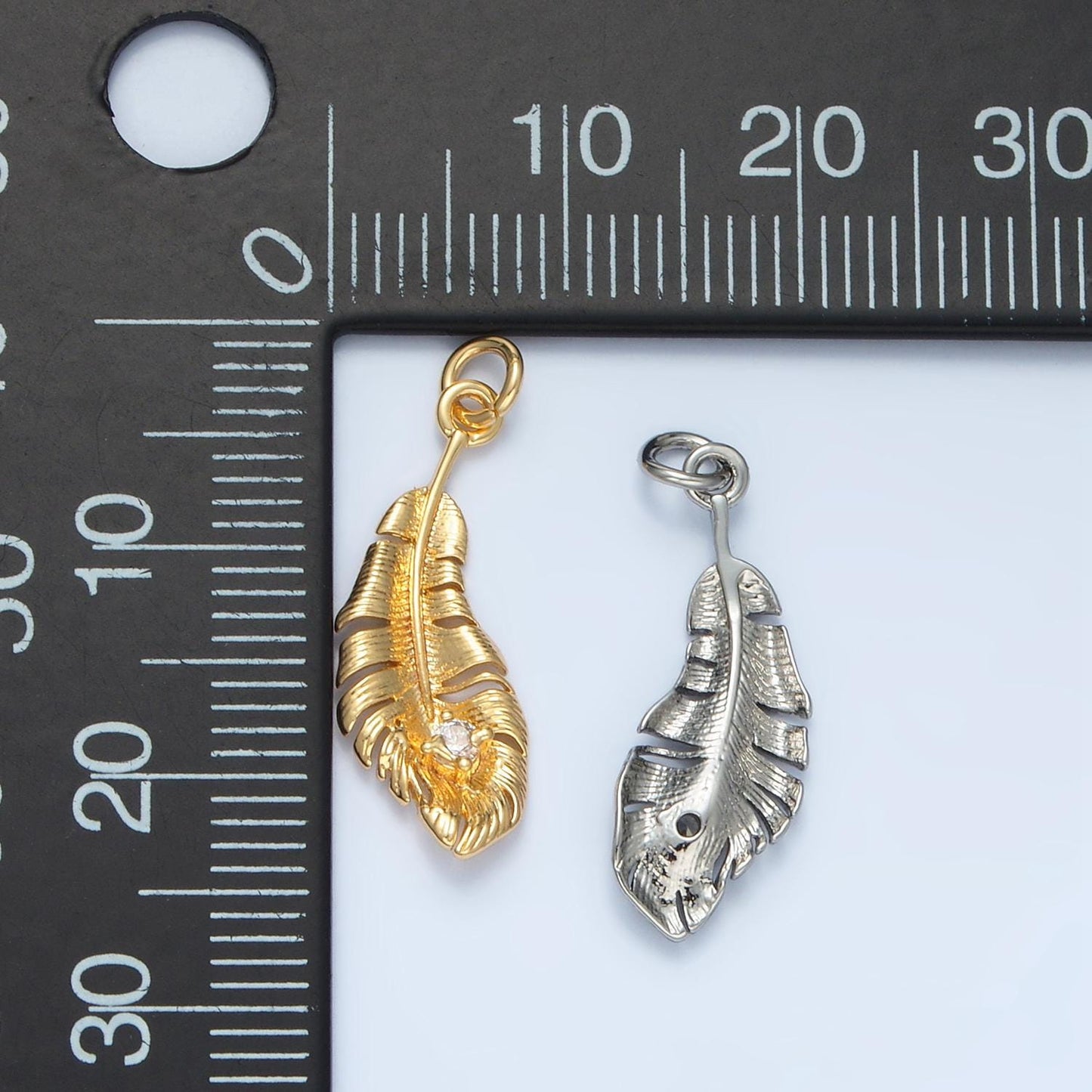 Bird feather cz paved in gold & silver dangle charm | e-383