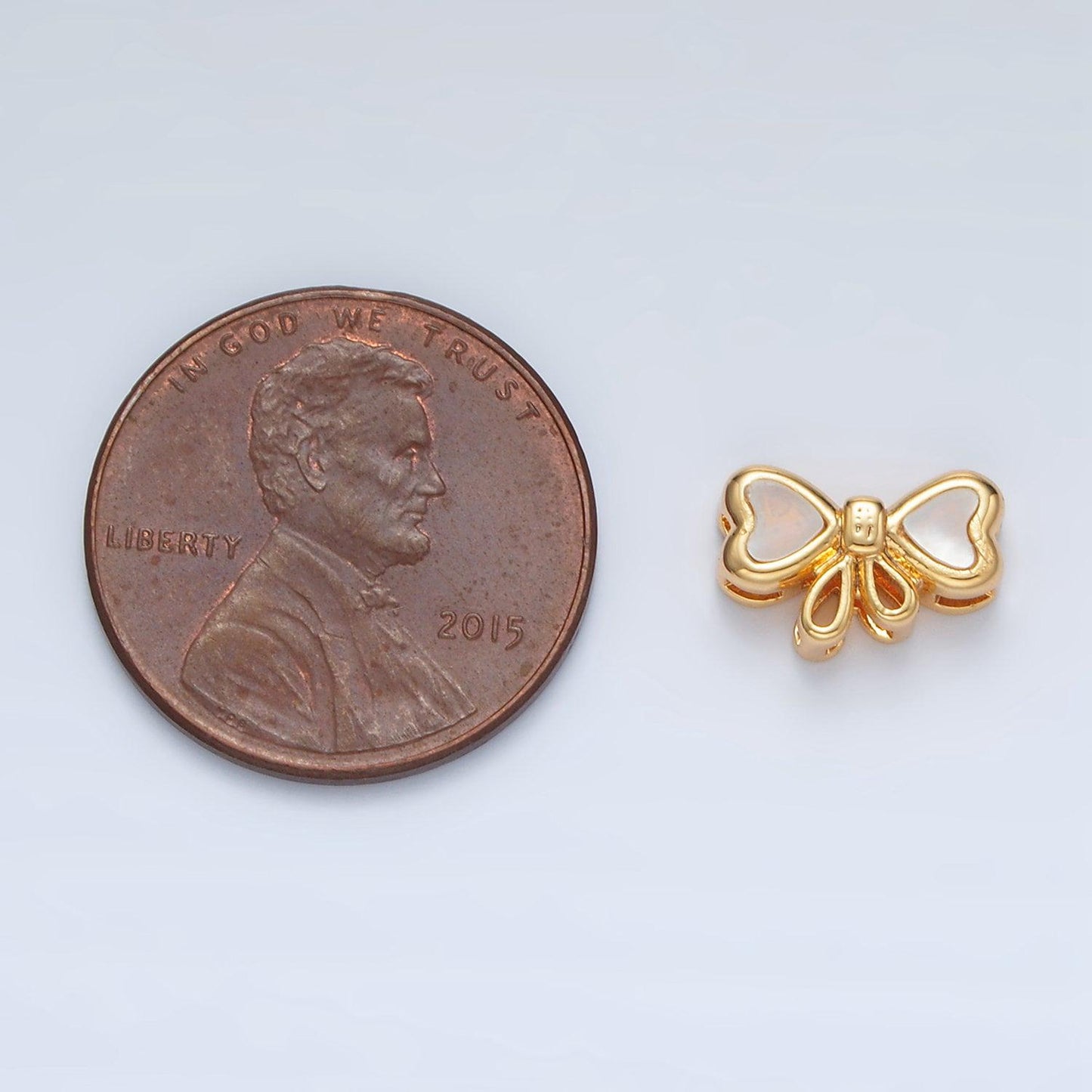 24k gold filled shell pearl mini bow bead 10mm | b-382