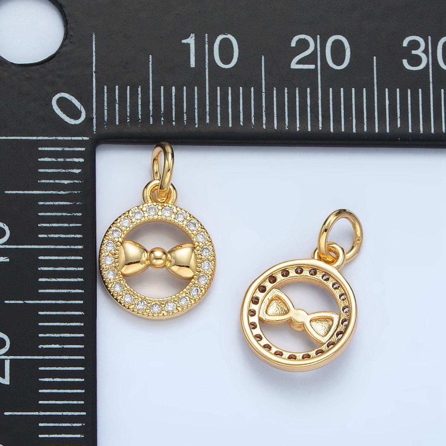 Mini gold filled bow in open round pendant micro paved cz | x-295