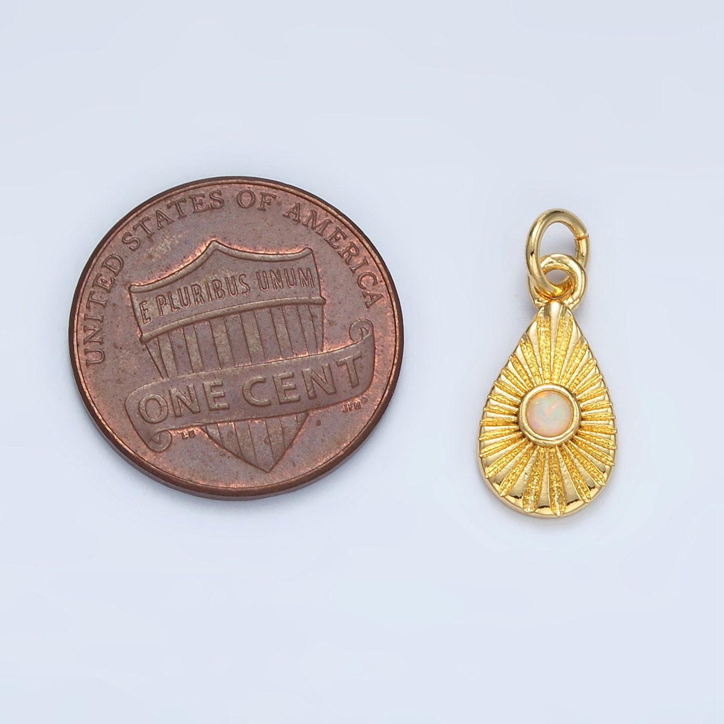 Gold filled sunburst teardrop with white opal charm | ag-857