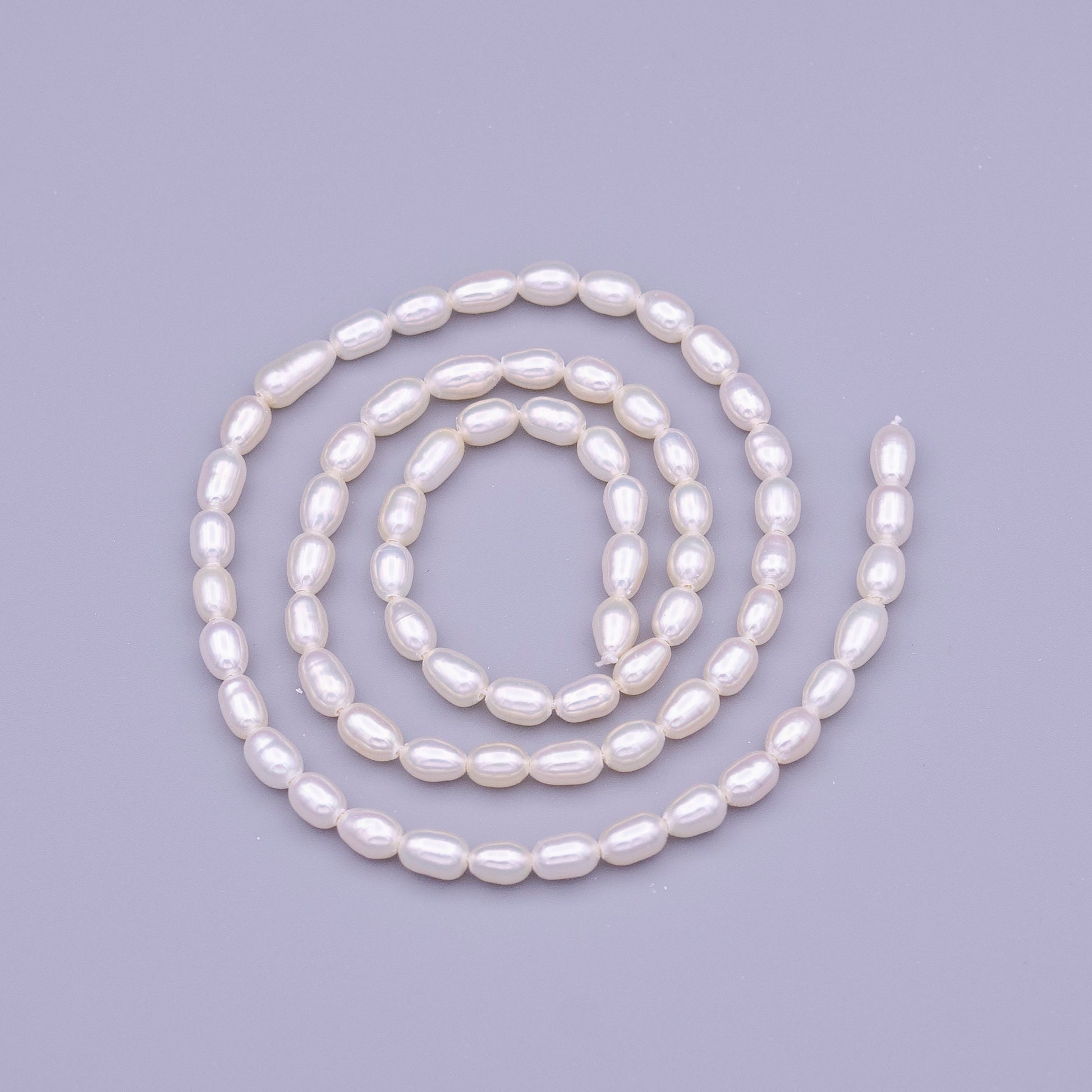 High Quality Grade AAA Natural Freshwater Potato Oval Nugget Keshi Pearl Beads - White 4mm Wholesale Pearl by Strand WA1318