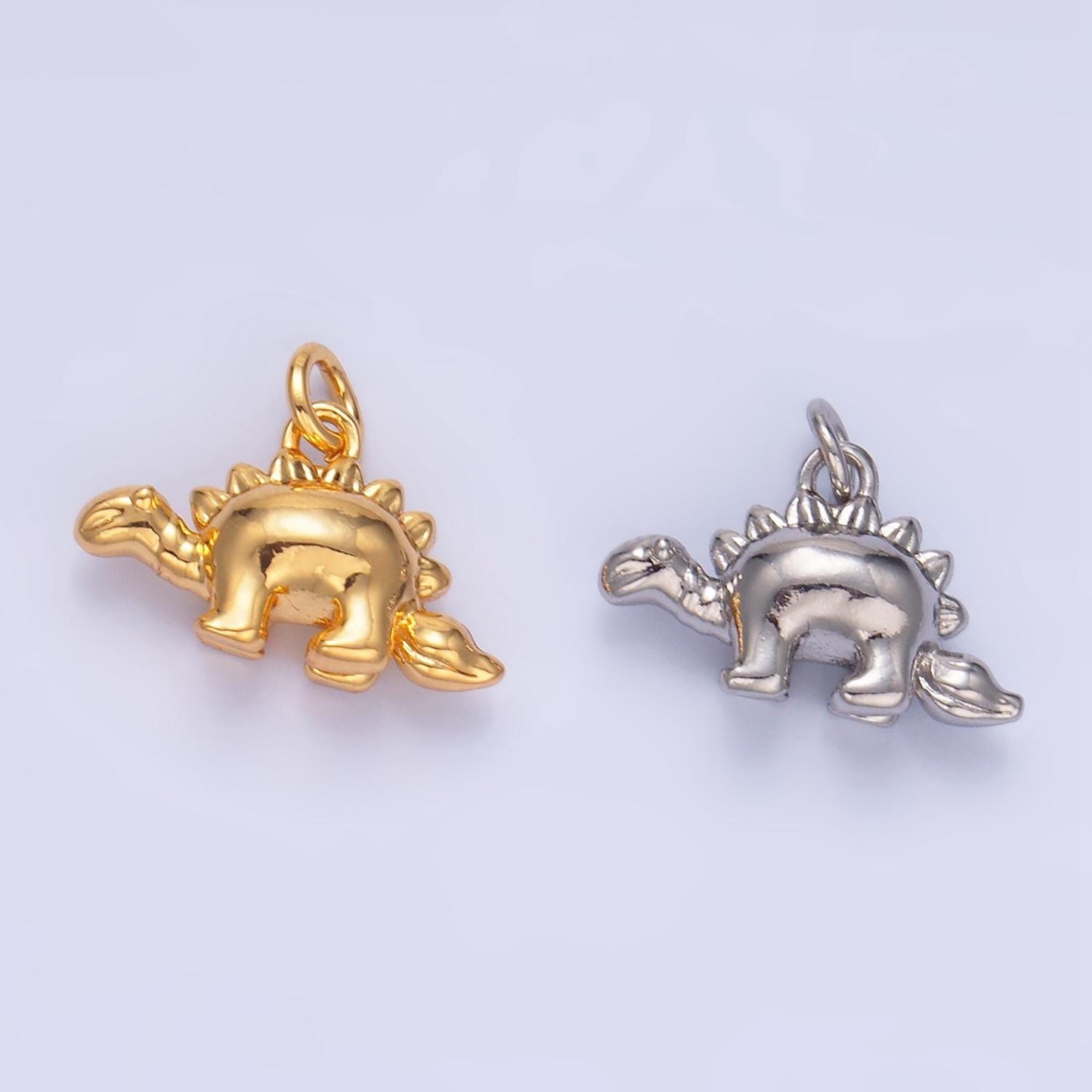 Mini Stegosaurus Charm Gold dinosaur pendant Jurassic animal extinct prehistoric charm. small jewelry. paleontologist W139