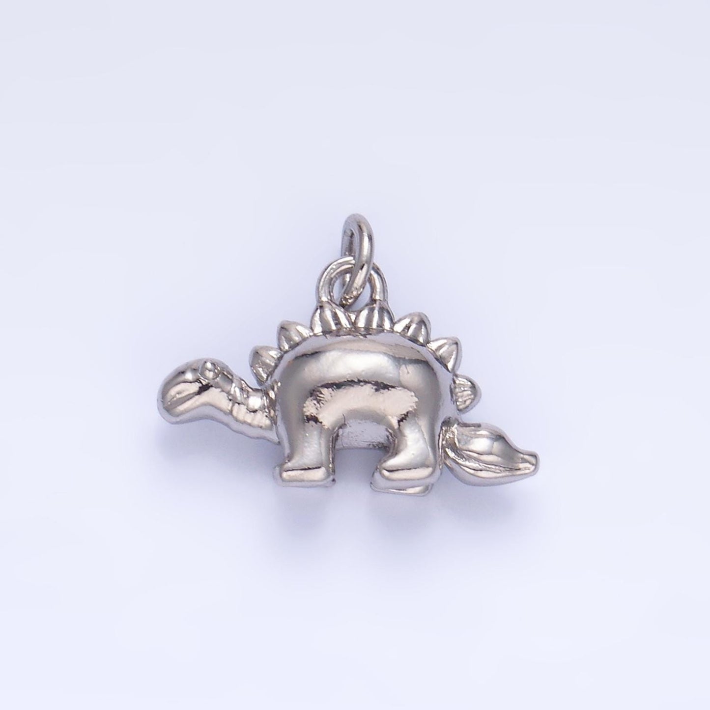 Mini Stegosaurus Charm Gold dinosaur pendant Jurassic animal extinct prehistoric charm. small jewelry. paleontologist W139