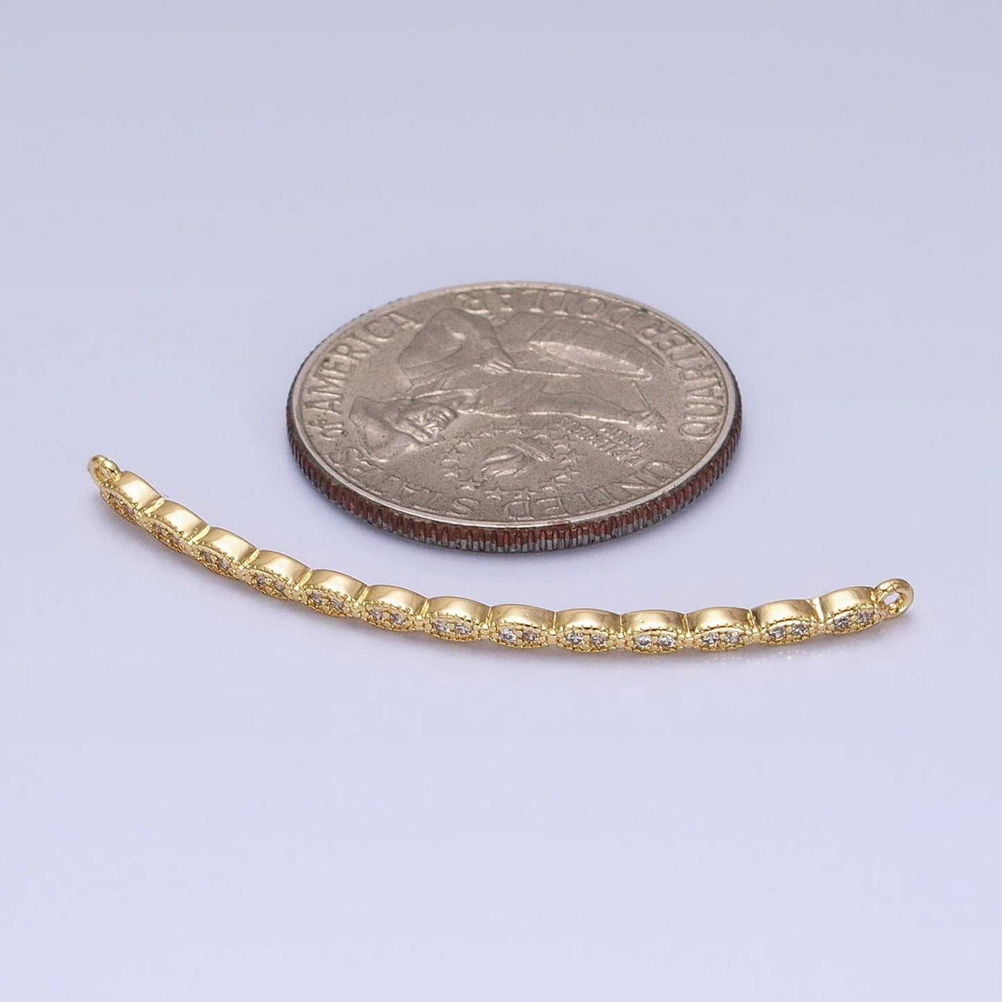Marquise-shaped lined micro paved clear cz link connector in gold & silver | y-853