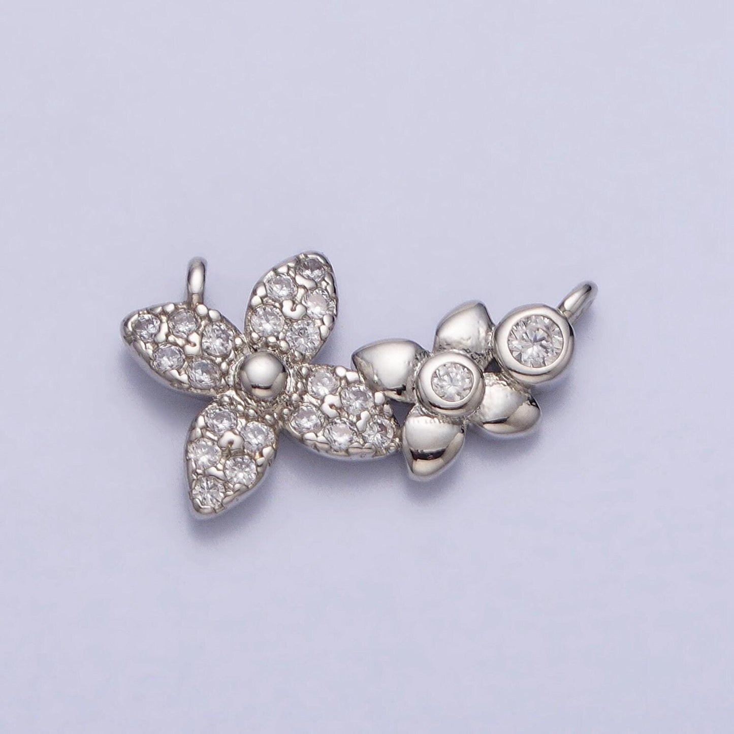 Gold micro paved round cubic zirconia flower link connector | f785
