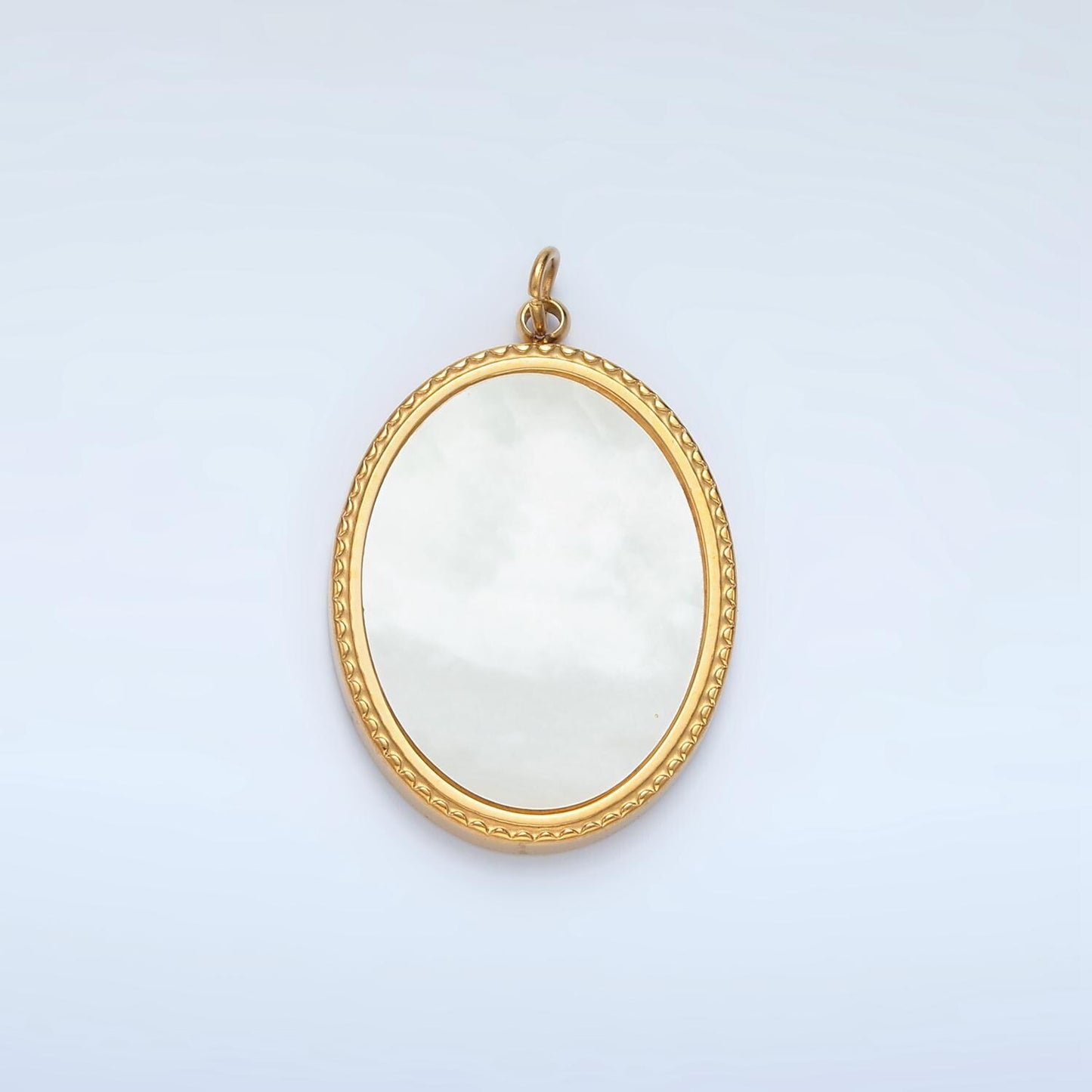 Gold stainless steel shell pearl oval bezel charm in gold p-1217