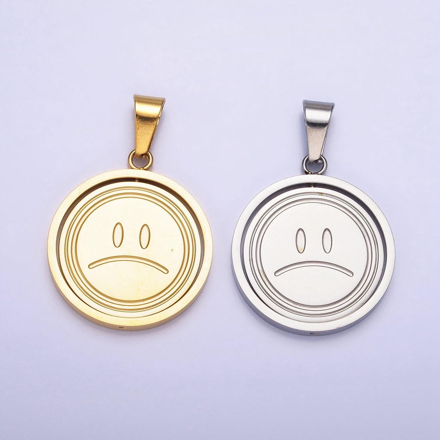Emotion charm emoticon inspired stainless steel spinning double sided happy face & sad face pendant in gold silver | p-1121