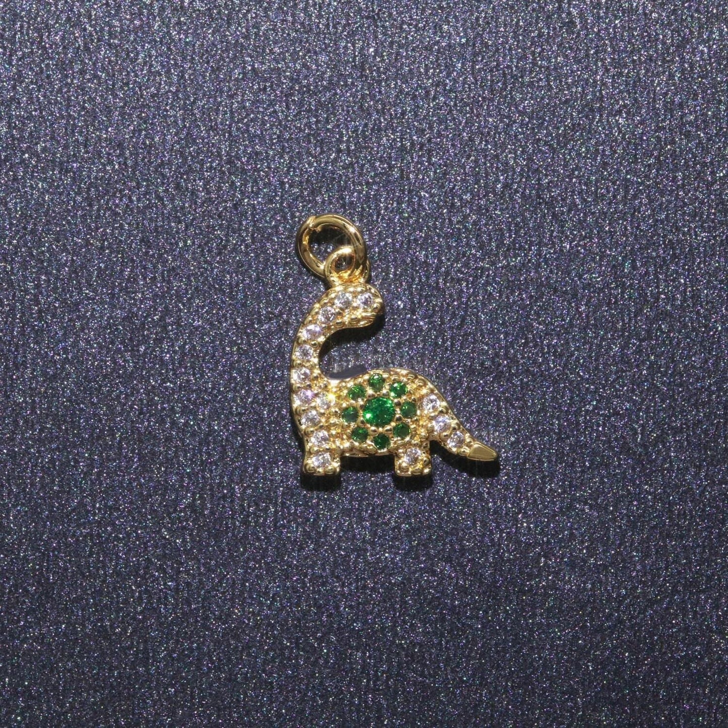 Tiny brontosaurus charm gold dinosaur pendant. jurassic animal extinct prehistoric charm. small jewelry. paleontologist