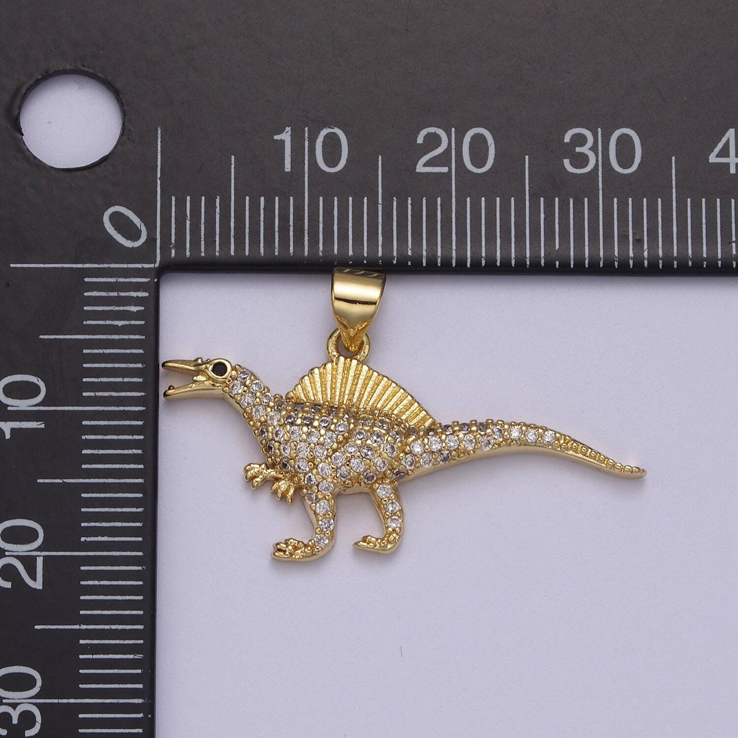 Dinosaur pendants in gold, spinosaurus charm dino jewelry in clear cubic zirconia j-334