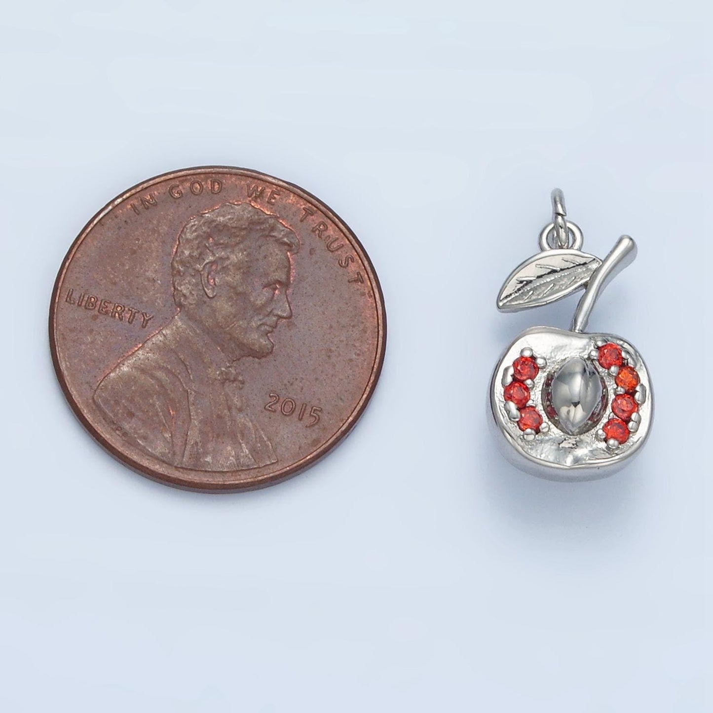 Silver & gold halve cut apple, red cz fruit charm | e-393