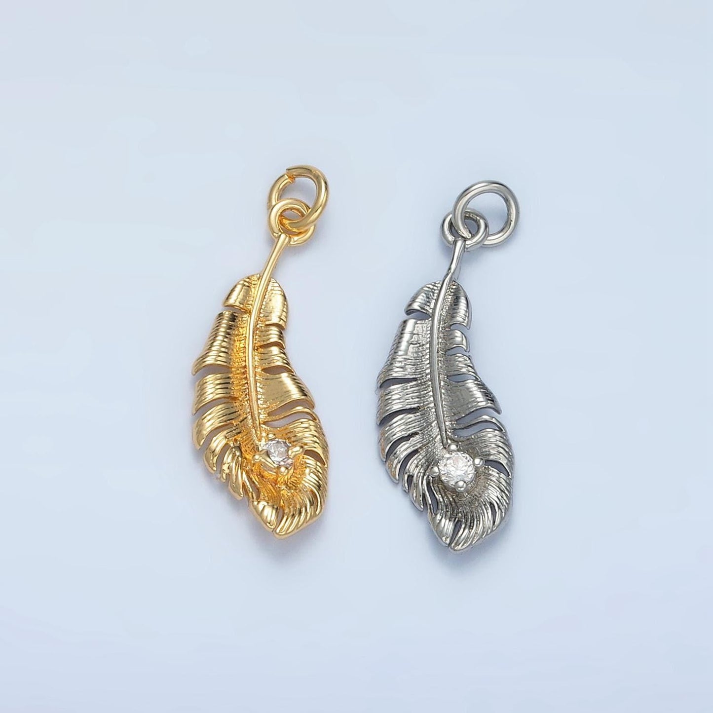 Bird feather cz paved in gold & silver dangle charm | e-383