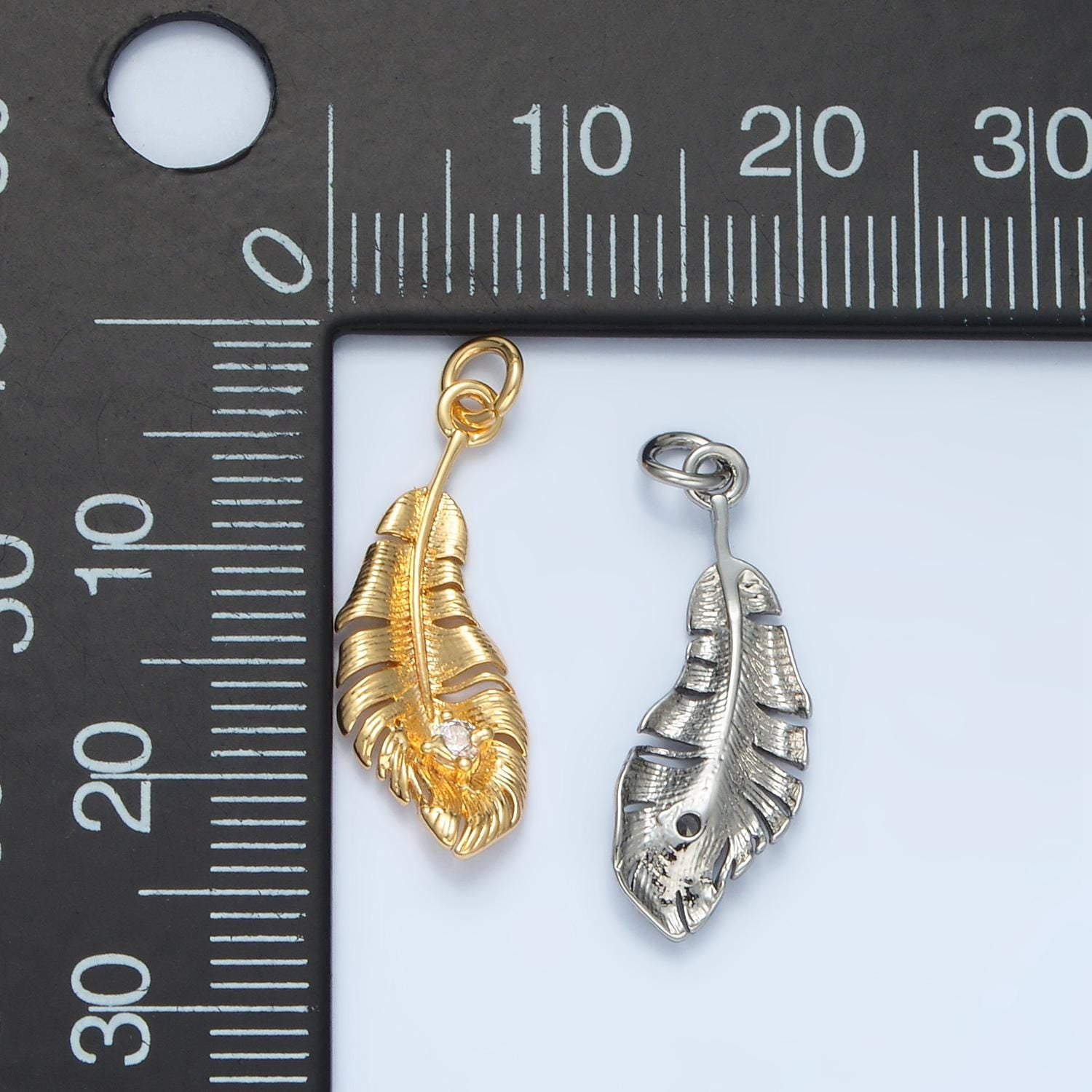 Bird feather cz paved in gold & silver dangle charm | e-383