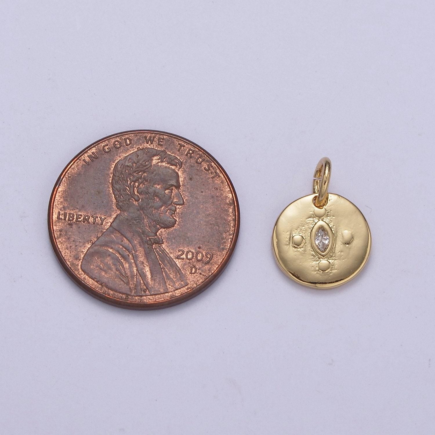 Mini gold round coin charm with clear eye cz stone c-578