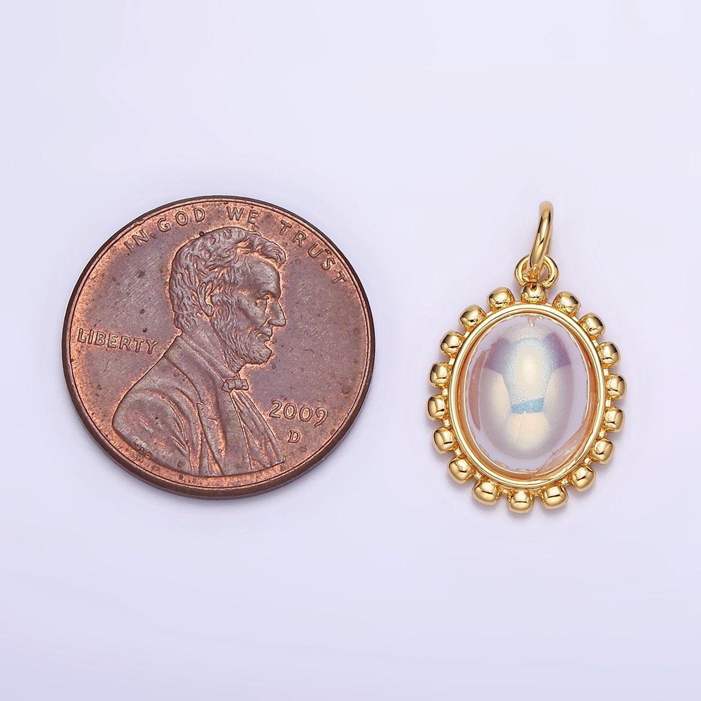 18k gold filled iridescent pearl oval dotted outline charm | ac1441