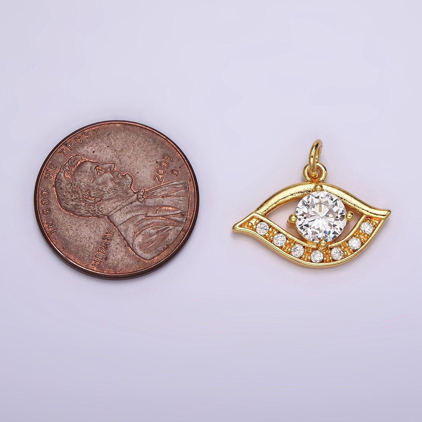 24k gold filled clear cz micro paved cz open evil eye of ra charm | ac870