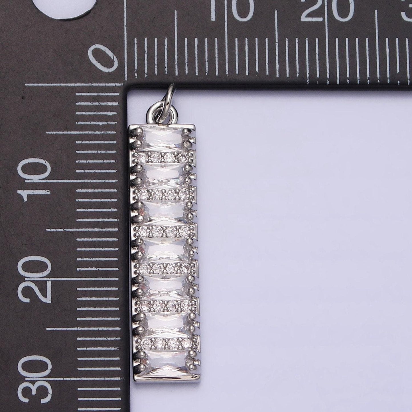 White gold filled 30mm clear cz baguette lined micro paved band tag charm | ac1306