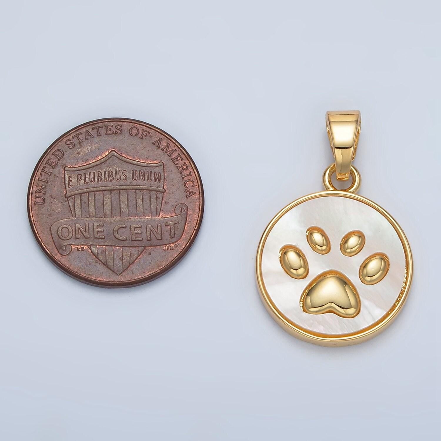 Gold round pearl pendant with paw imprint in gold | aa-1372