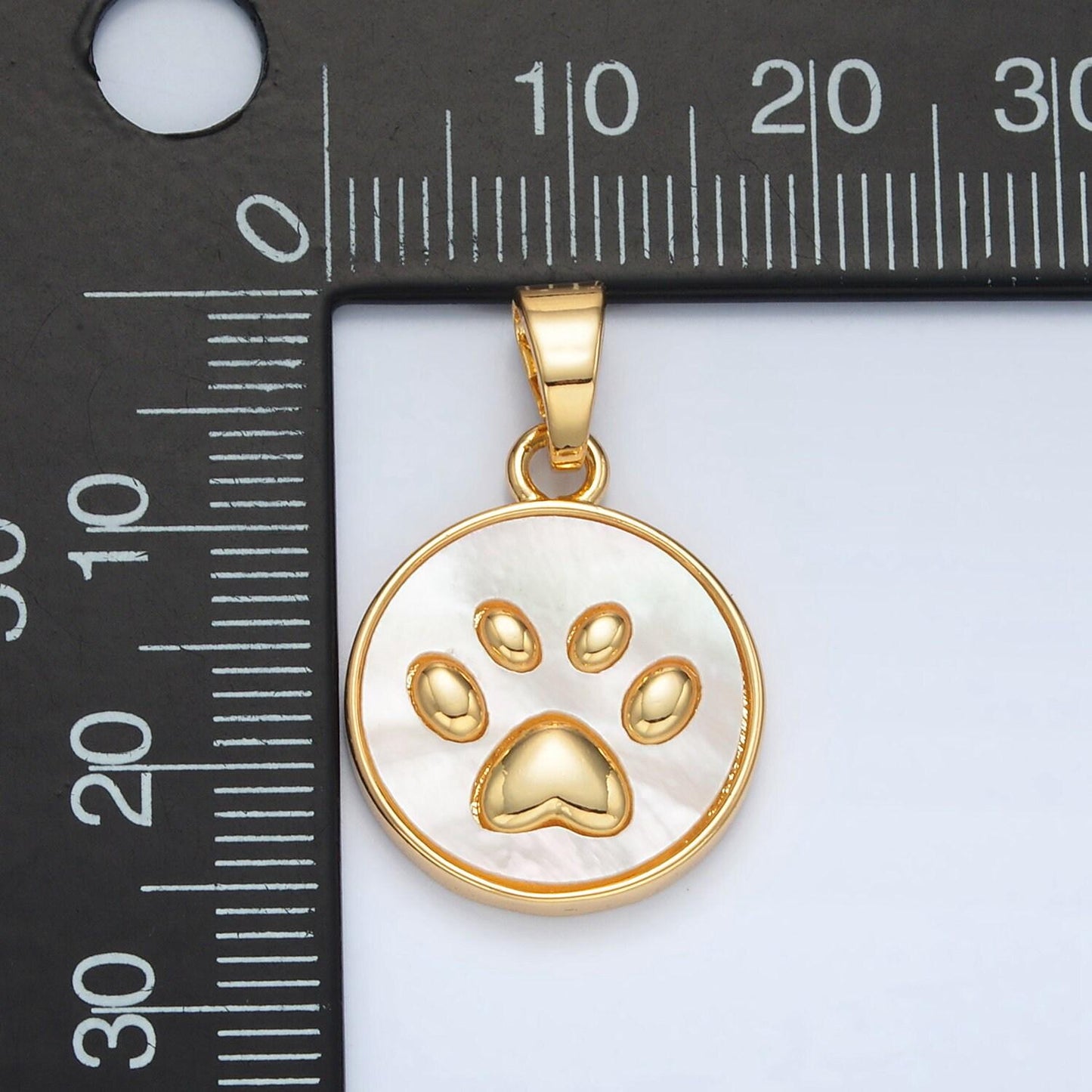 Gold round pearl pendant with paw imprint in gold | aa-1372