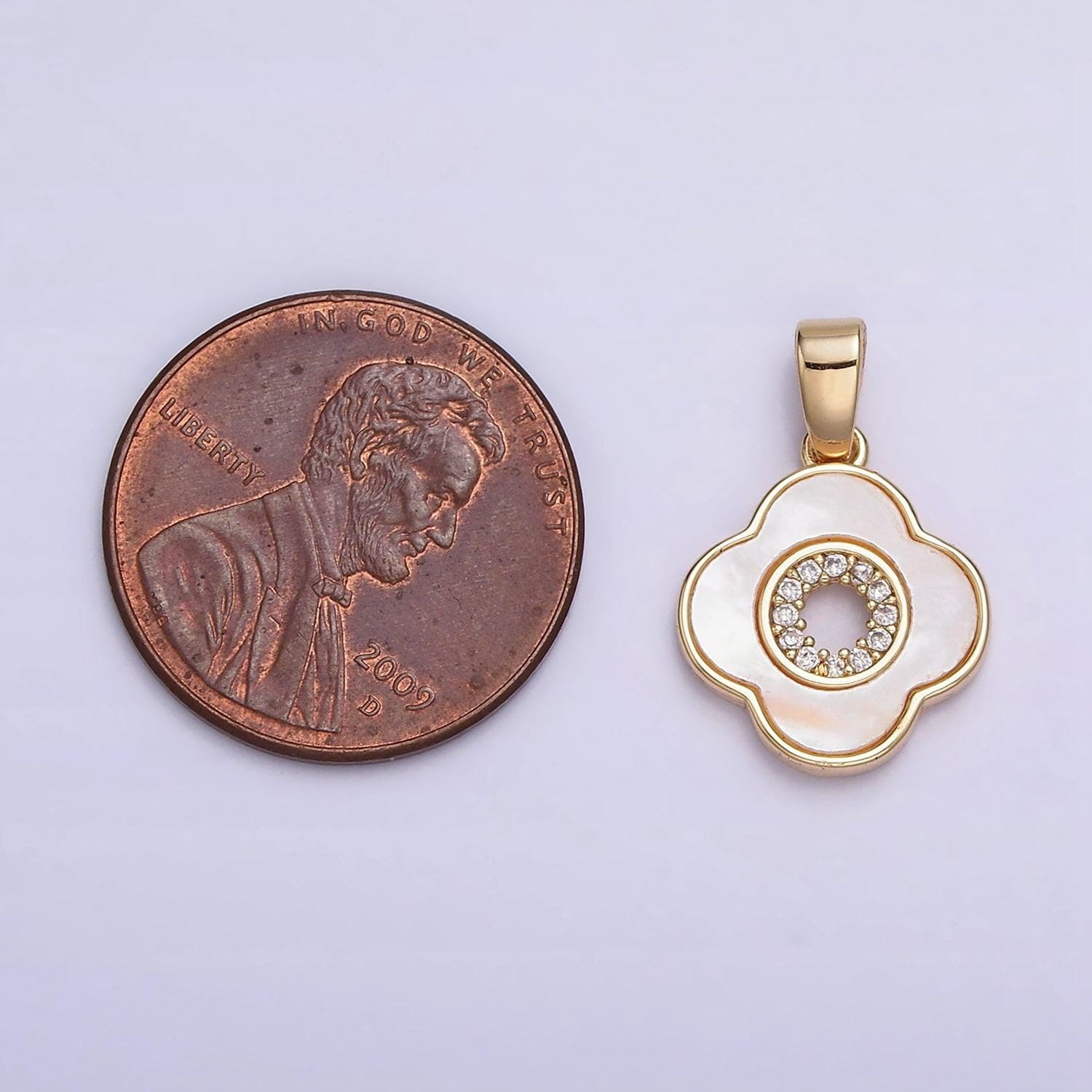 24k gold filled shell pearl micro paved cz open quatrefoil pendant | aa575