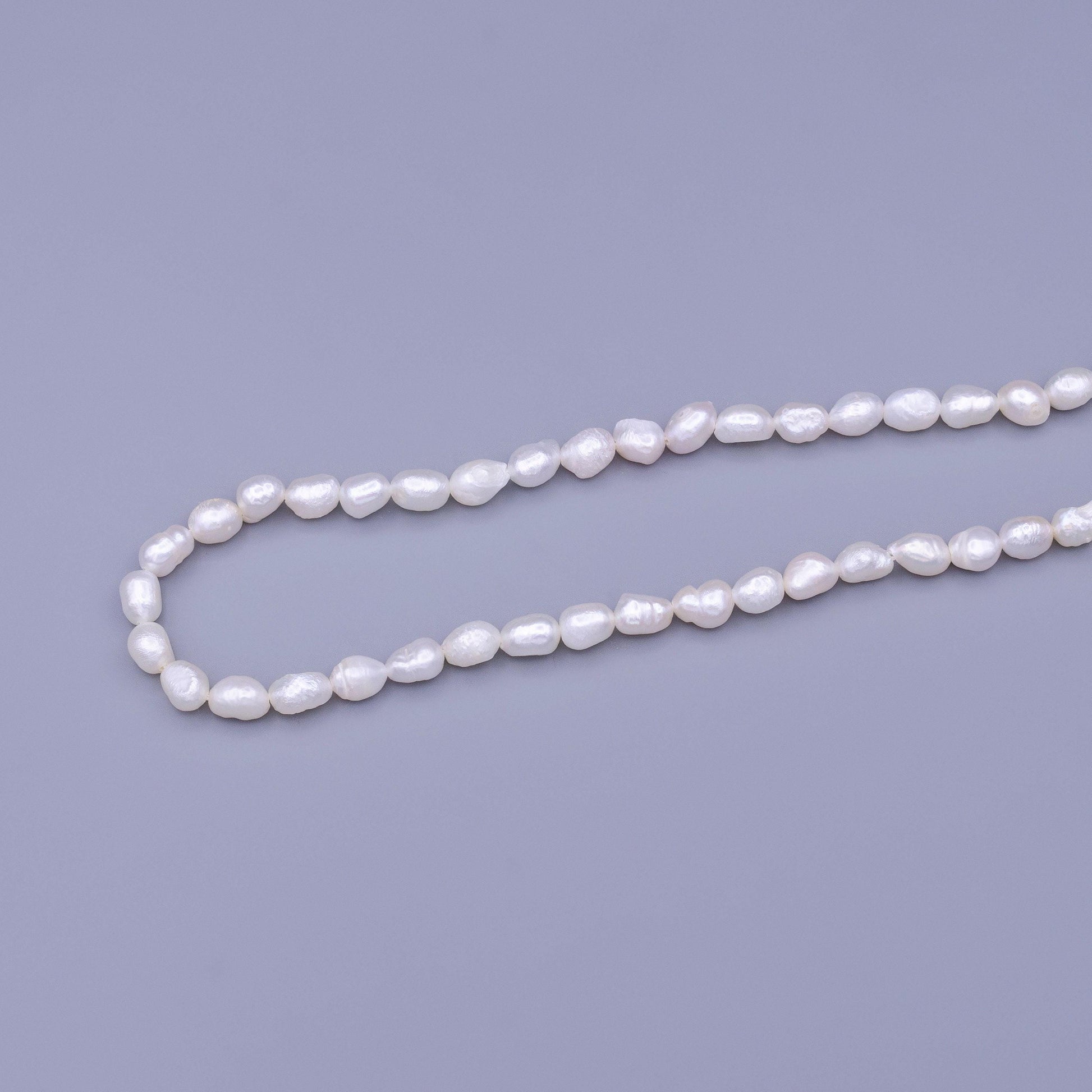 Aaa pearls beads genuine freshwater pearl 5.5mm small off round oval potato pearl white per strand wholesale wa-1672