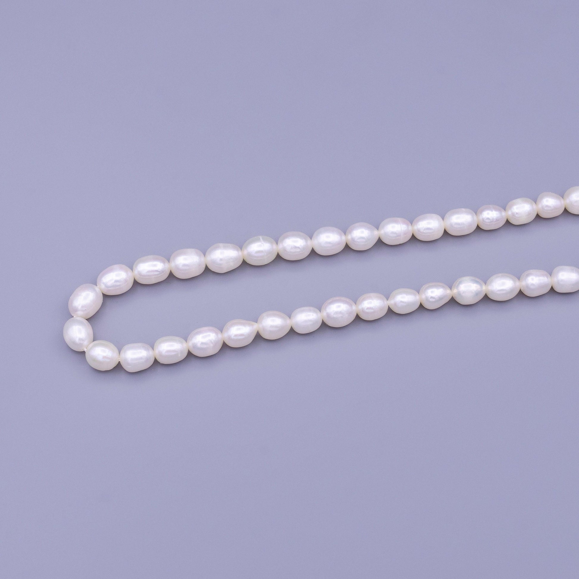 Aaa pearls beads genuine freshwater pearl 7.3mm potato oval rice pearl white per strand wholesale loose pearl by strand - wa-1666