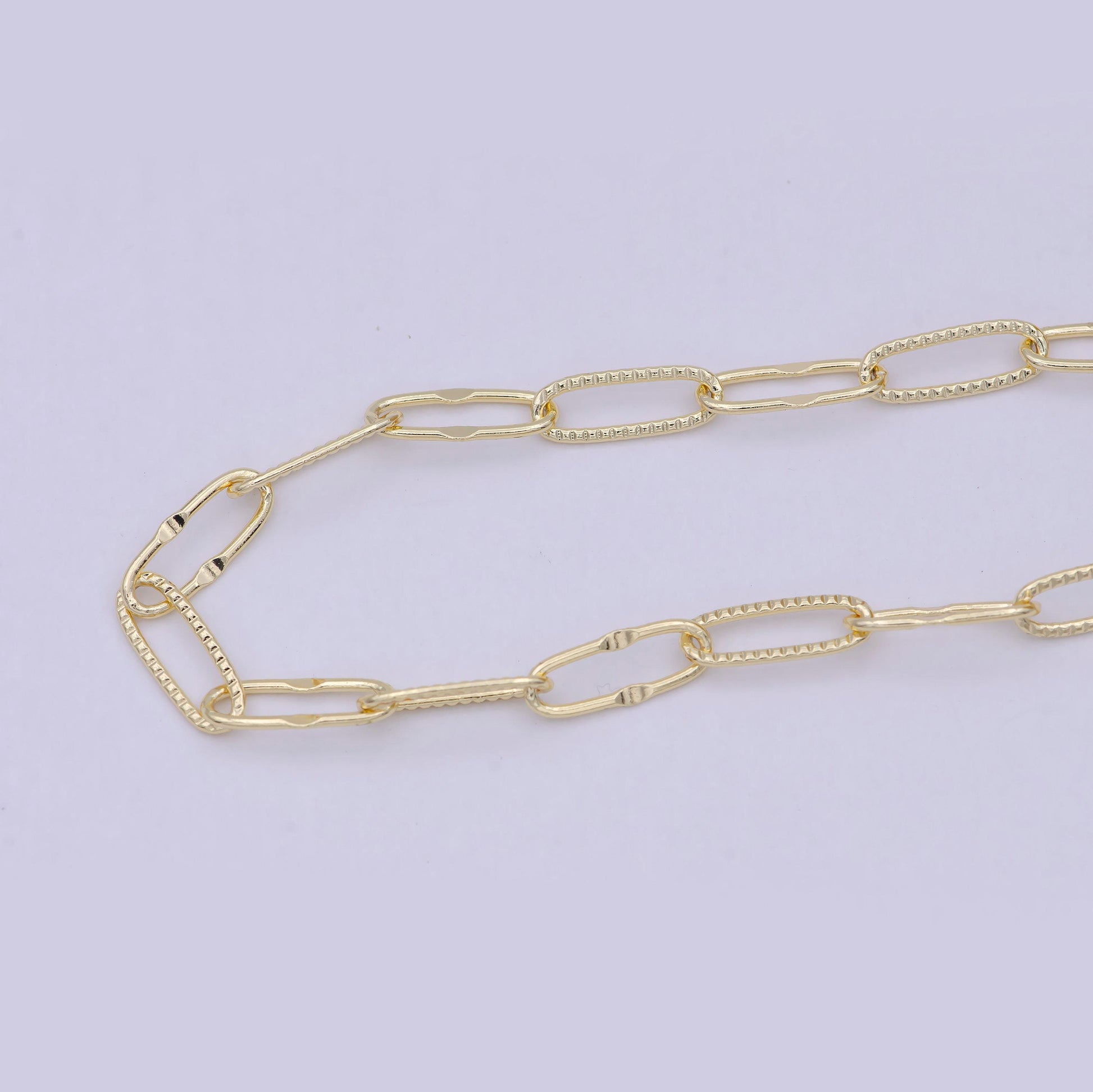 Oval gold embosed paper clip chain by yard, link chain wholesale bulk roll chain for jewelry making, size 14.5mm x 5.5mmmm, roll-712
