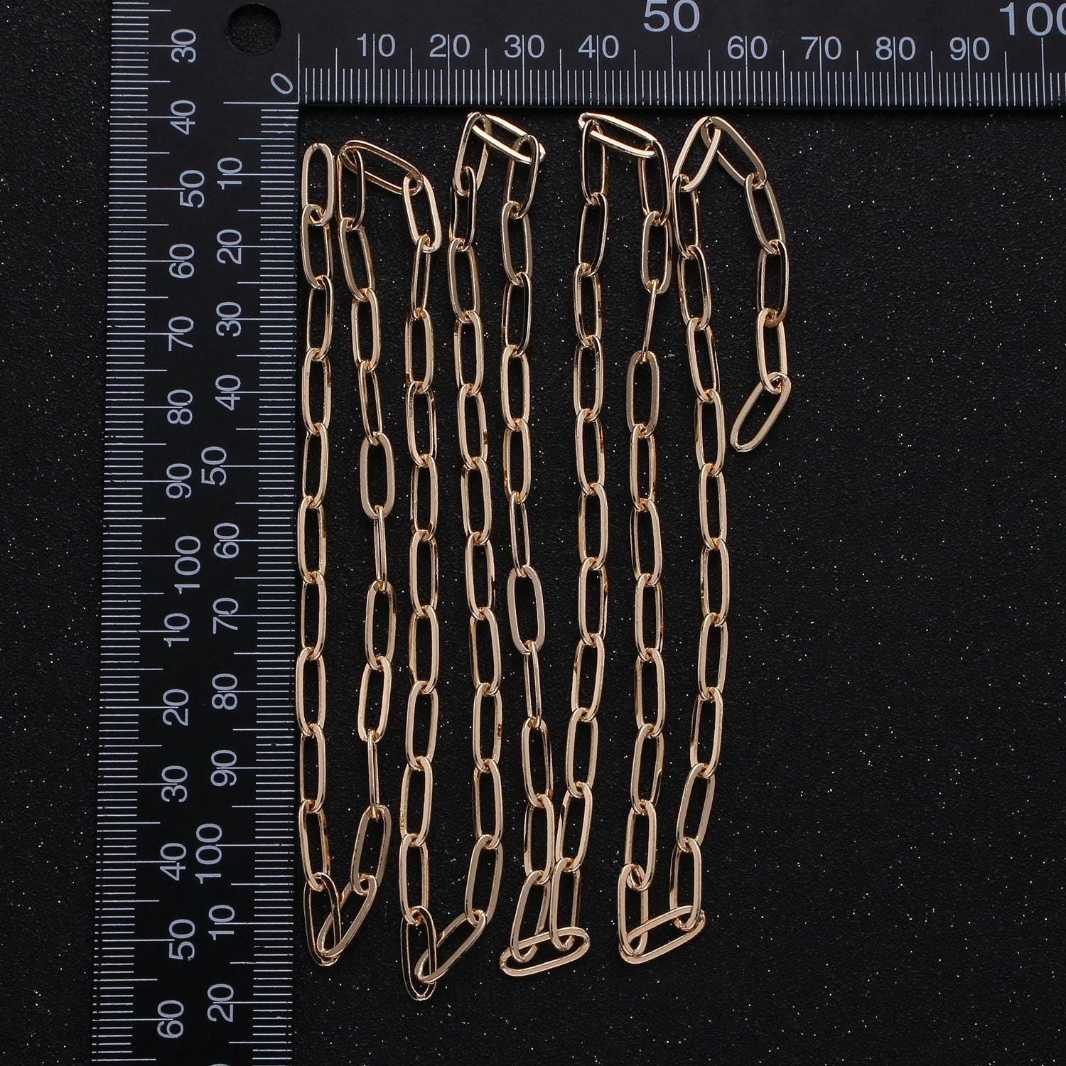 0.6mm gold paperclip rolo cable chain by yard, 18k gold filled 11mmx4mm bulk wholesale paper clip chain by yard | roll-312