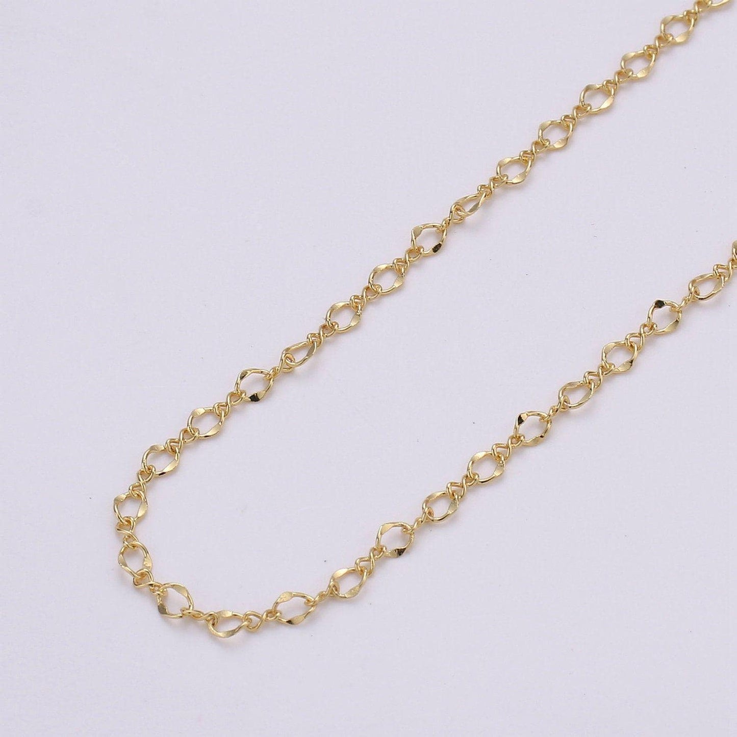 Gold pounded oval chain by yard, figure 8 link chain, twisted wholesale bulk roll chain for bracelet, necklace, anklet jewelry making,137
