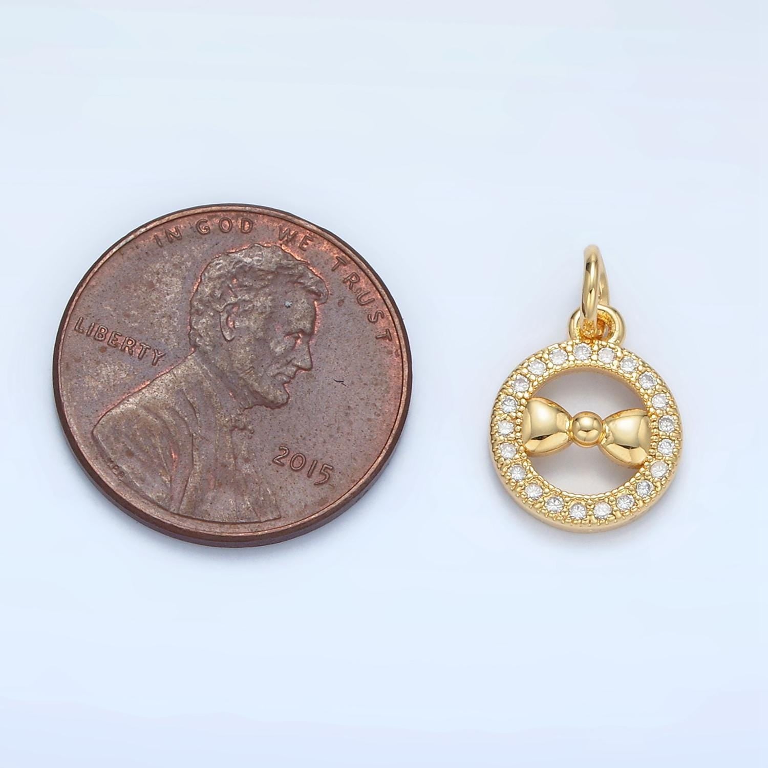 Mini gold filled bow in open round pendant micro paved cz | x-295