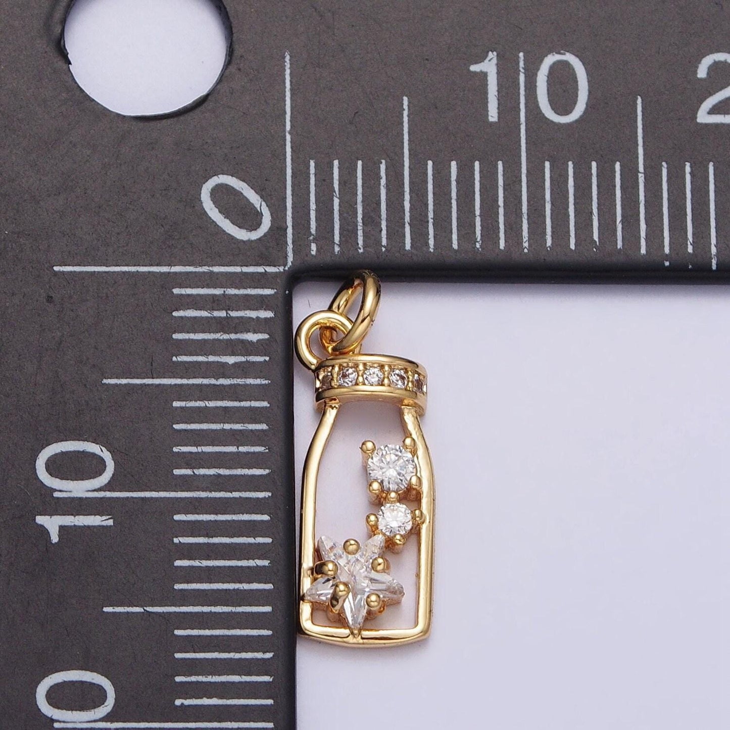 Mini gold bottle charm with cz star n-277