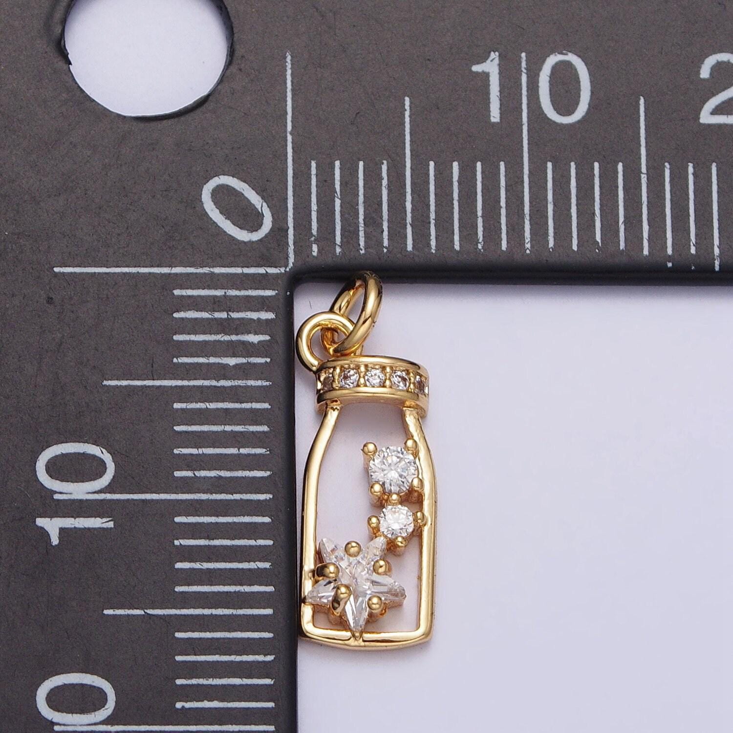 Mini gold bottle charm with cz star n-277
