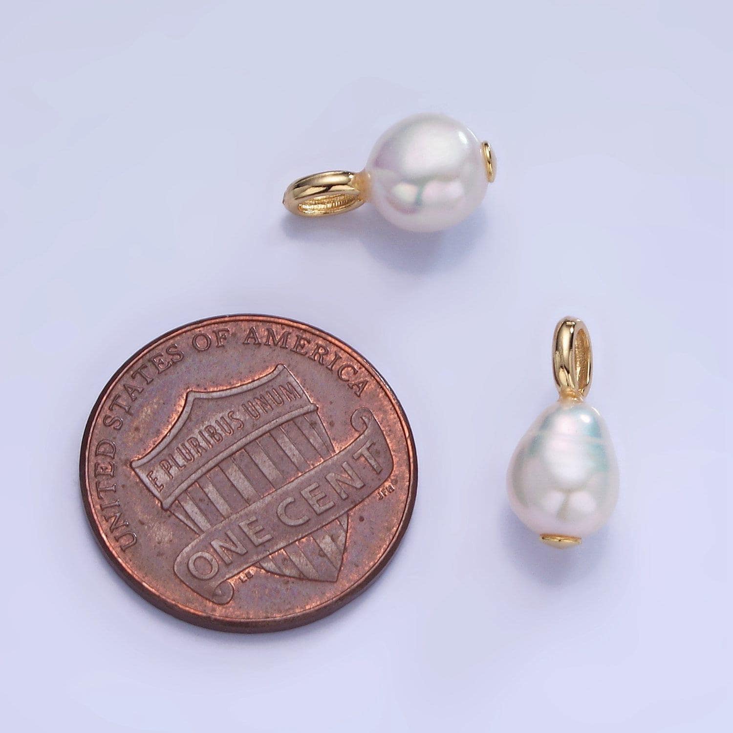 Gold ringed teardrop pearl pendant | p1730