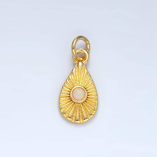 Gold filled sunburst teardrop with white opal charm | ag-857