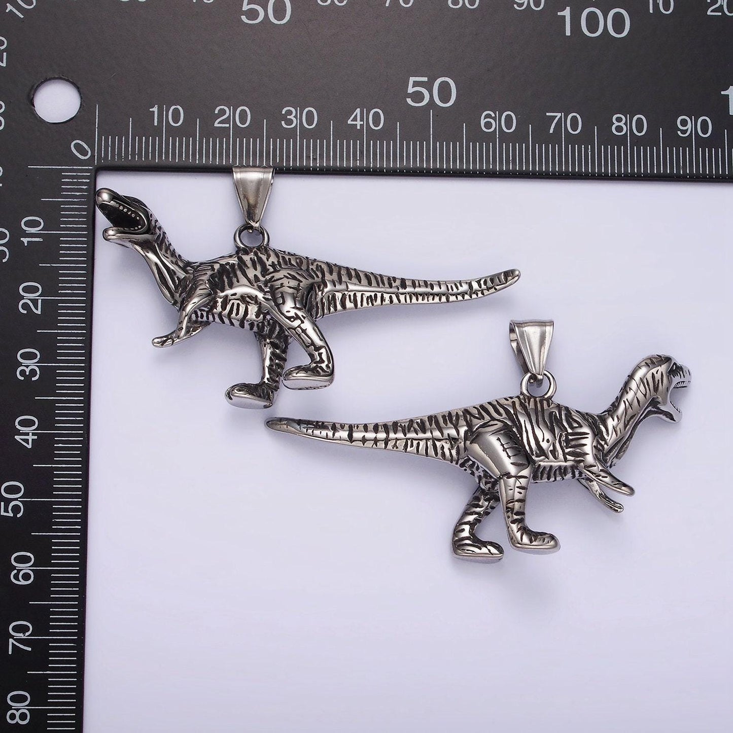 Stainless steel raptor, carnivore dinosaur pendant | p-1193