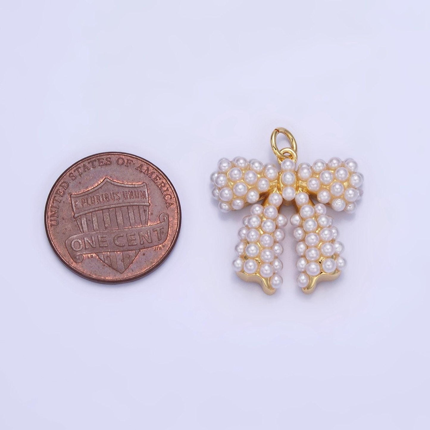 Pearl ribbon bow charm 20mm gold & silver | c-028