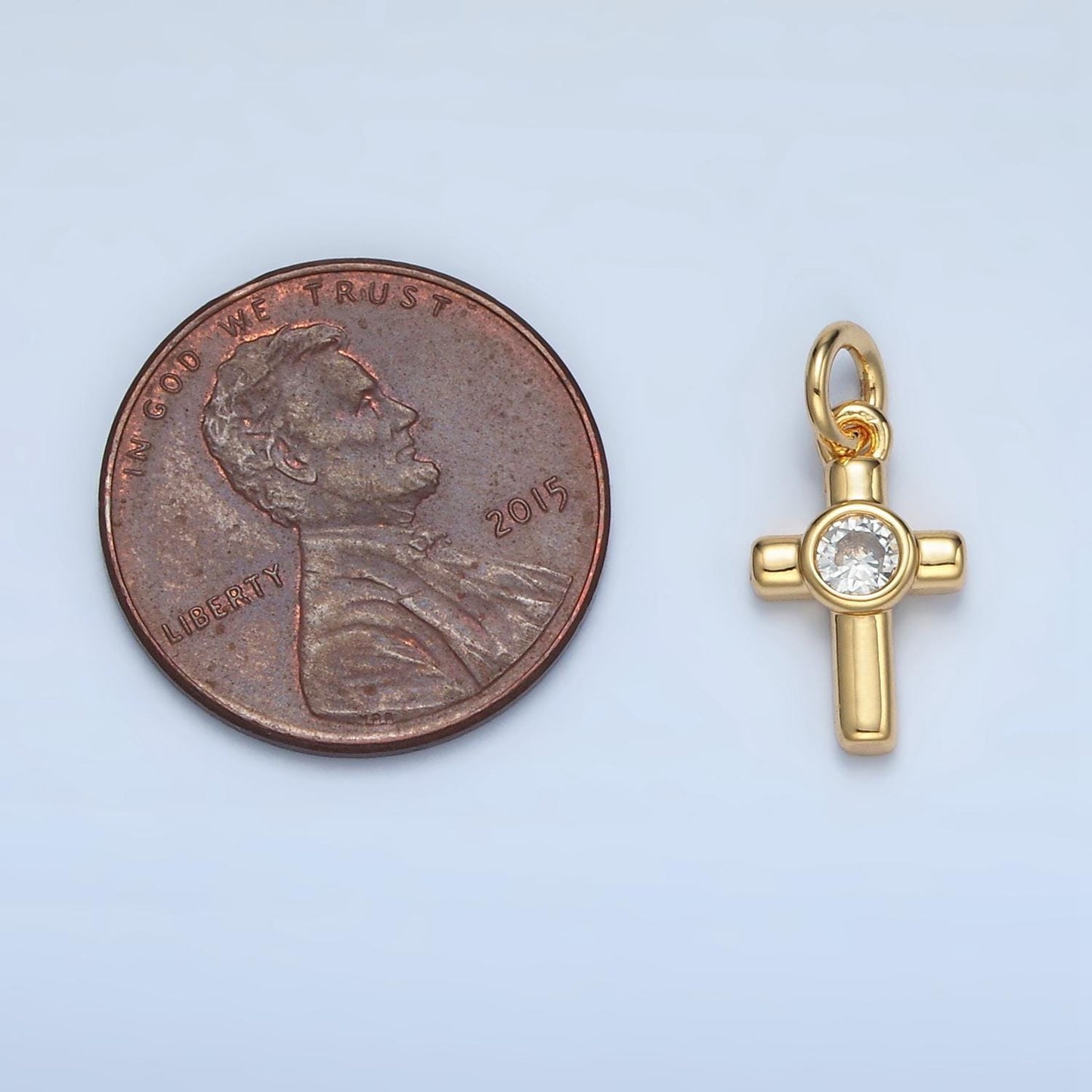 Singular cz on 24k gold filled small religious cross charm | e-180