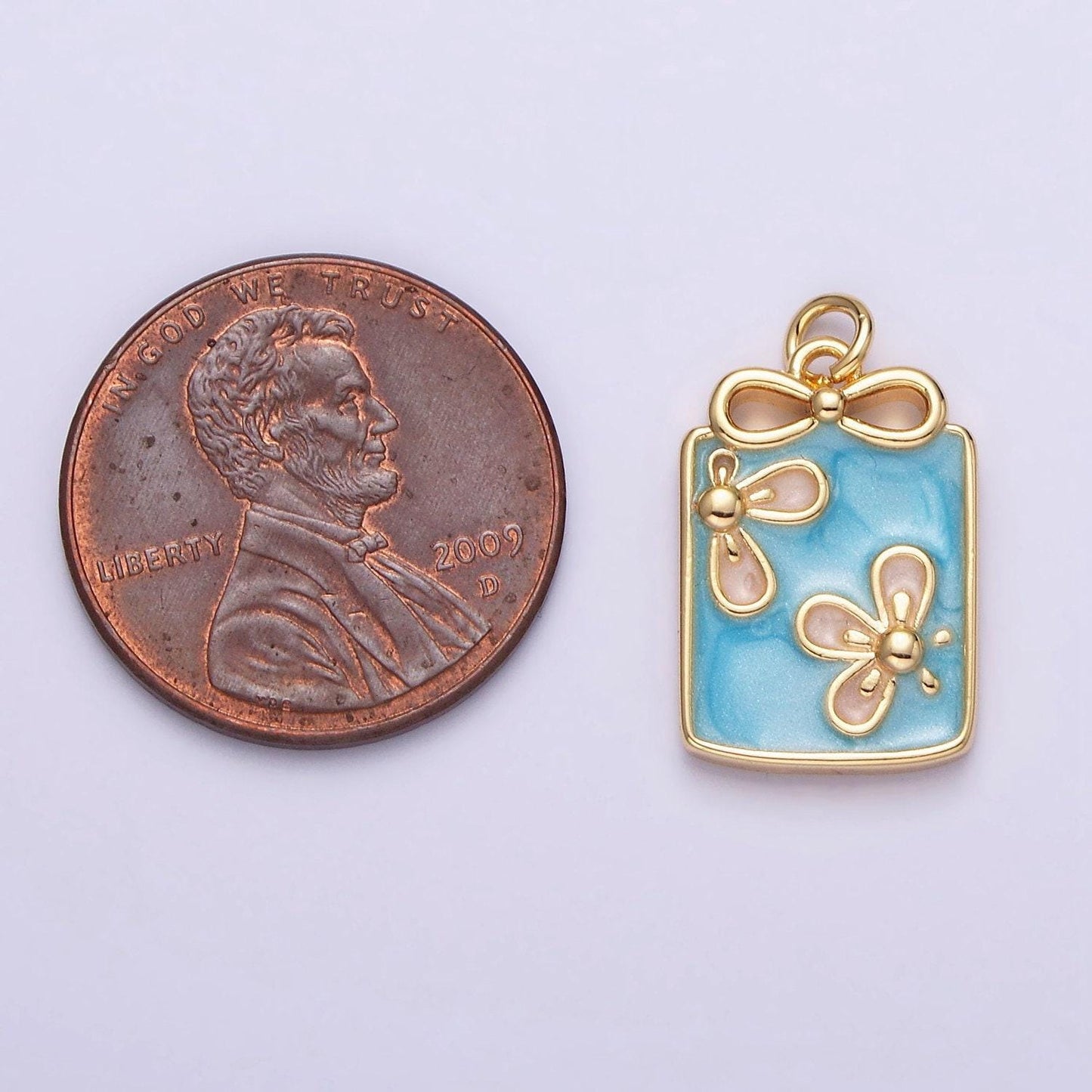 16k gold filled flower white, blue, pink sparkly enamel ribbon bow rectangular charm in gold & silver | ac1344 - ac1349