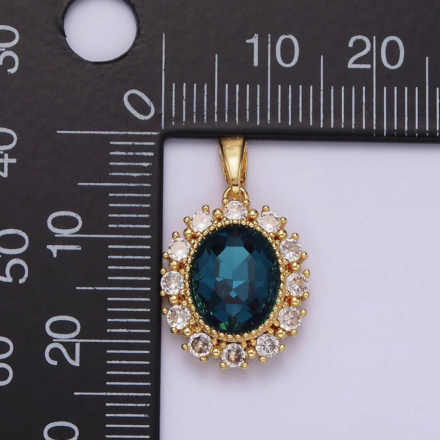 14k gold filled blue multifaceted cz dotted outlined oval pendant in gold & silver | n1800 n1801