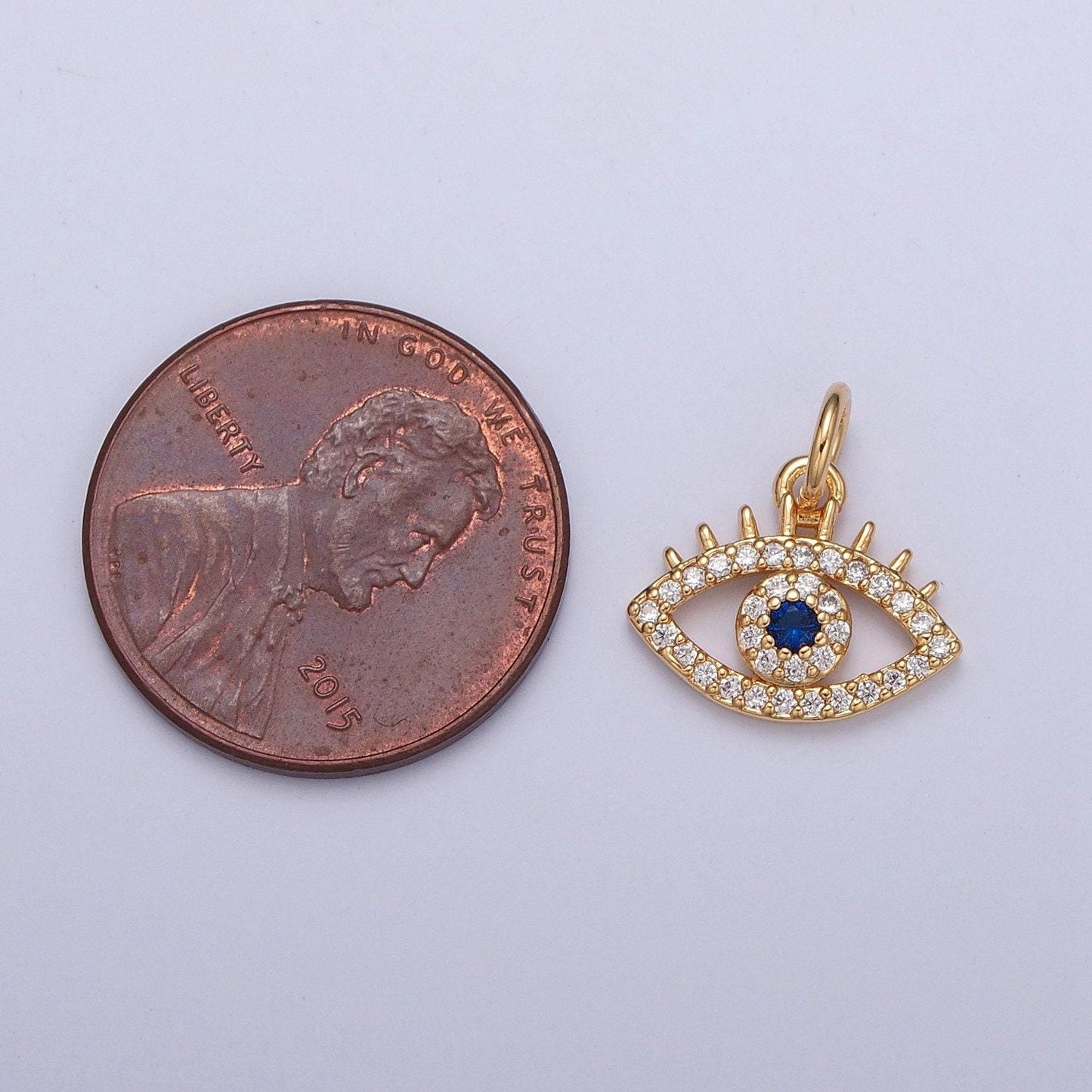 24k gold blue evil eye w. clear micro pave cz stones around protection amulet pendants | x-118