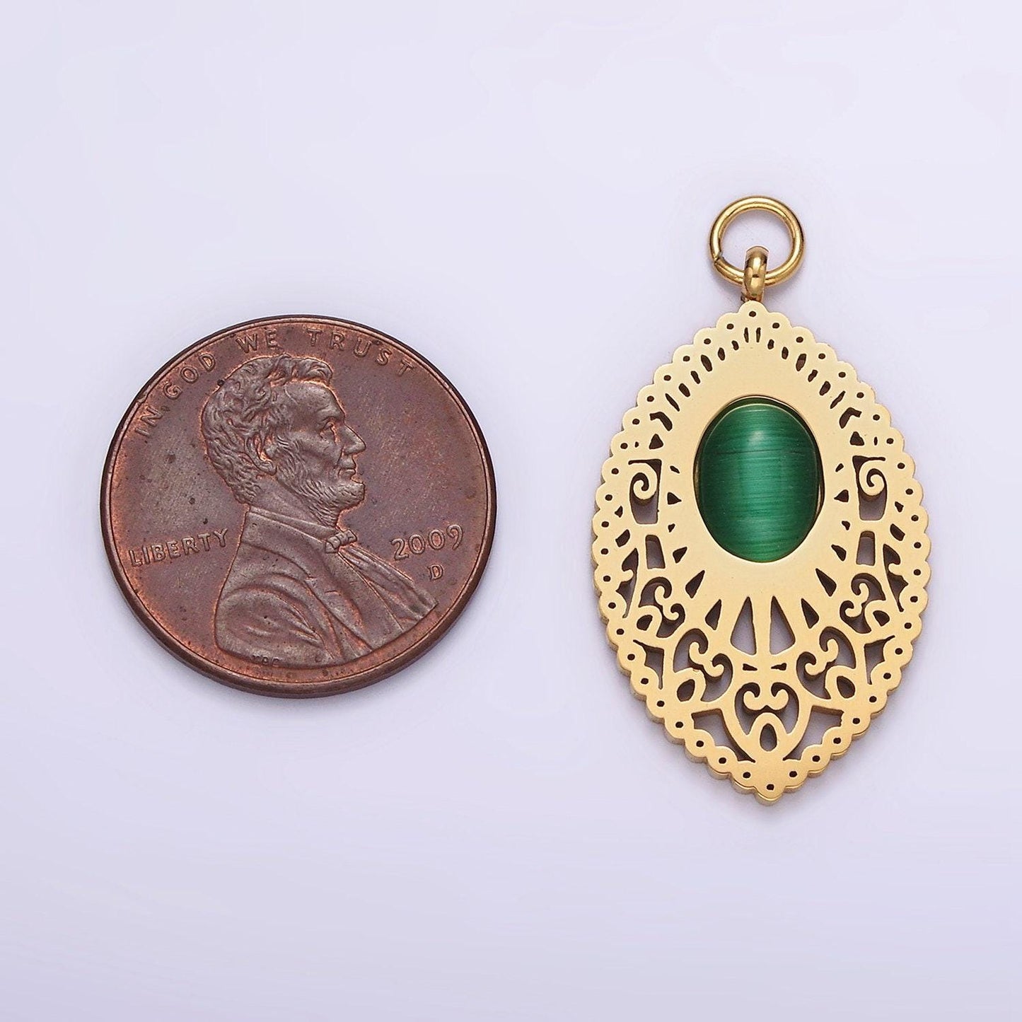 Stainless steel green cat's eye artisan oval sphere charm in gold & silver | p1271
