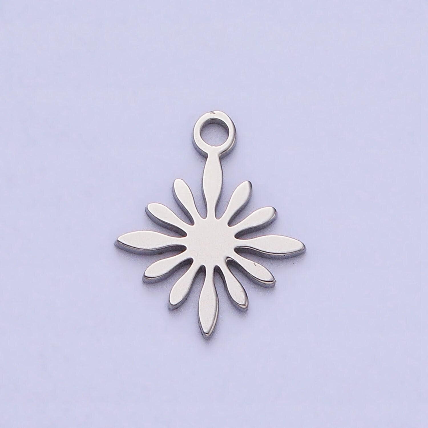 Mini stainless steel starburst burst charm in gold & silver star sun celestial pendant lead nickel free tarnish free | p-905