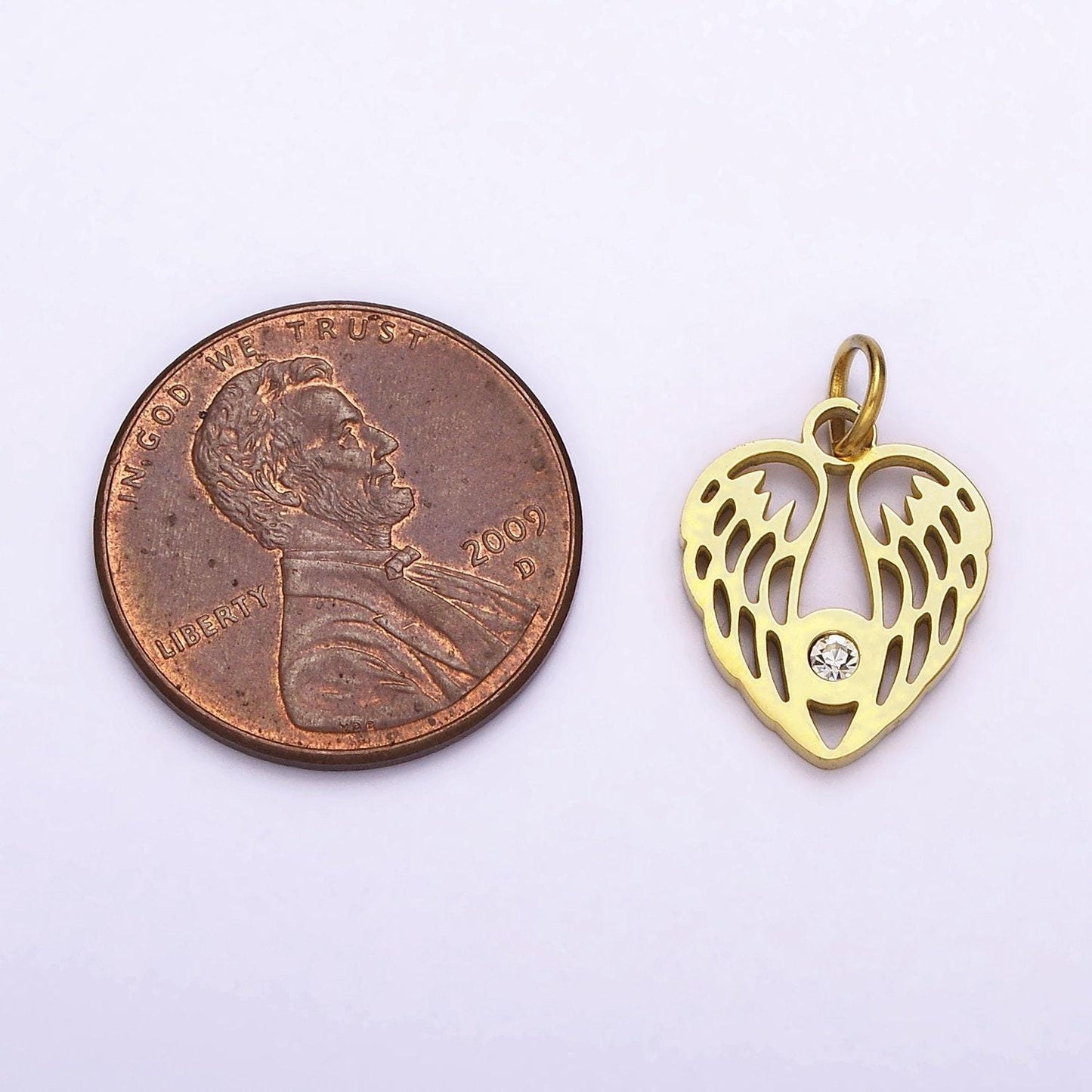 Dainty gold angel wing charm in stainless steel heart pendant p-705