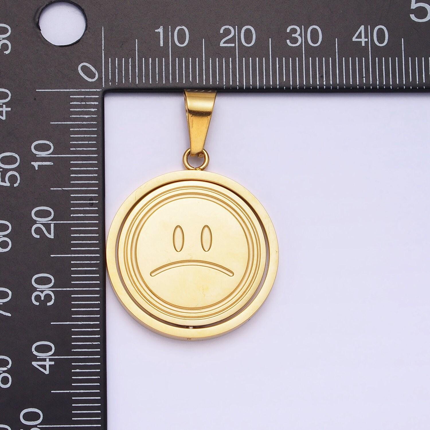 Emotion charm emoticon inspired stainless steel spinning double sided happy face & sad face pendant in gold silver | p-1121