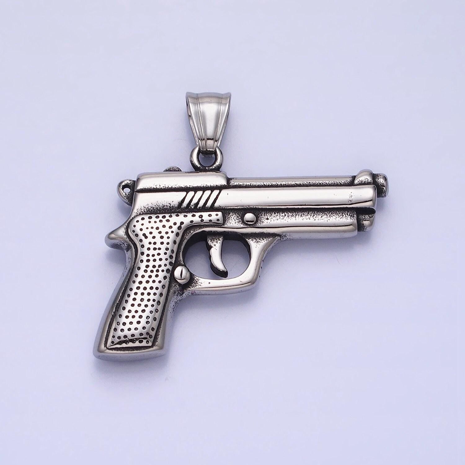 Stainless steel pistol gun pendant in silver & gold | p-1108