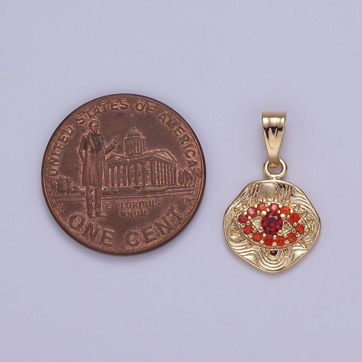 Dainty evil eye charm with orange / topaz cubic zirconia pendant j-425 j-426