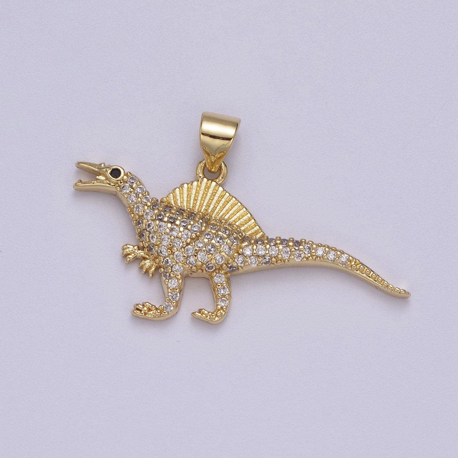 Dinosaur pendants in gold, spinosaurus charm dino jewelry in clear cubic zirconia j-334