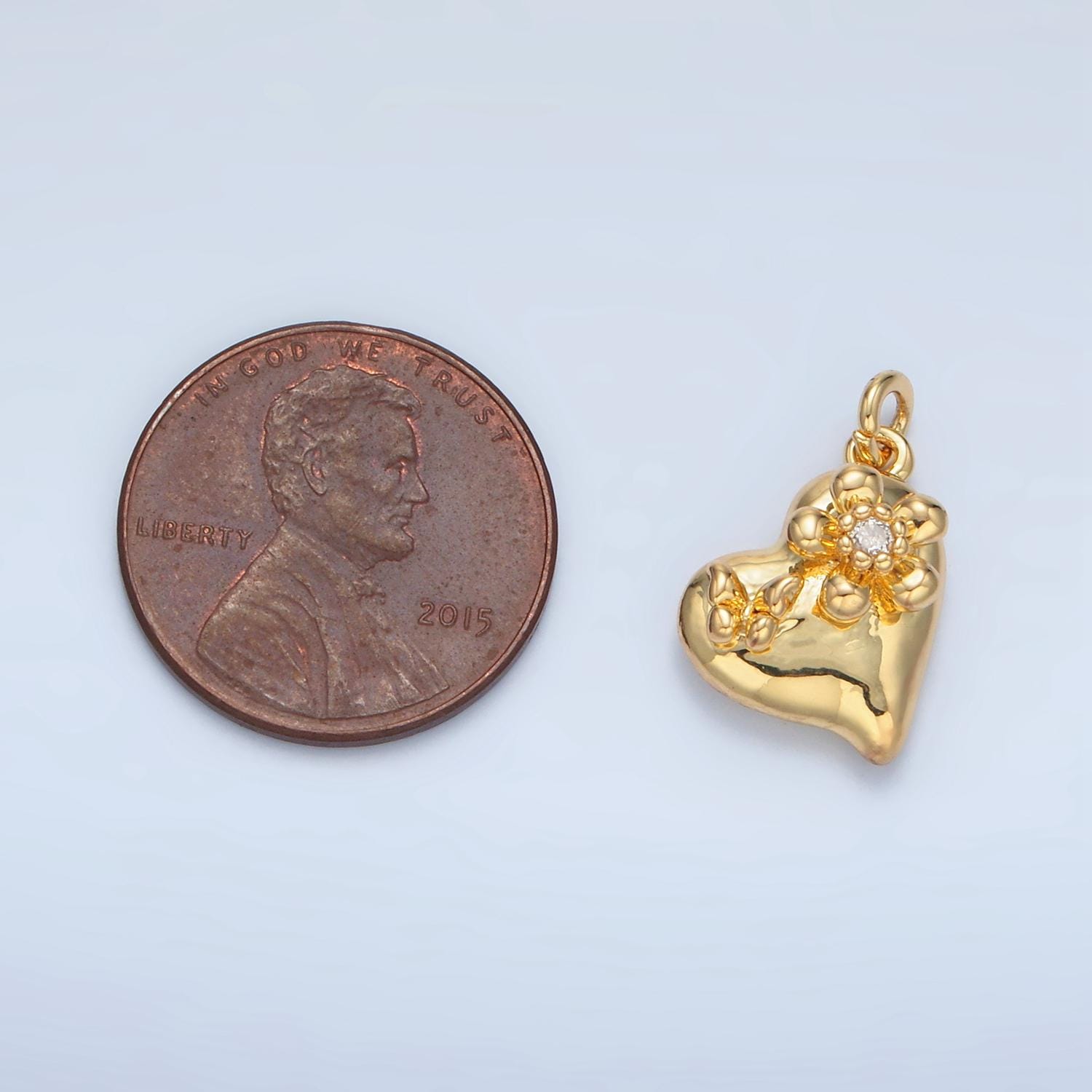 Small heart with butterfly and cz flower charm in gold & silver | e-395