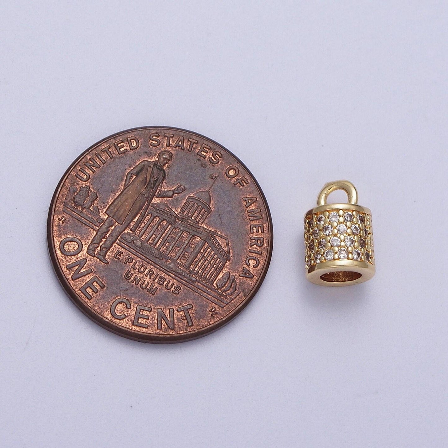 Clear micro paved surround cylinder tube mini gold charm | c586