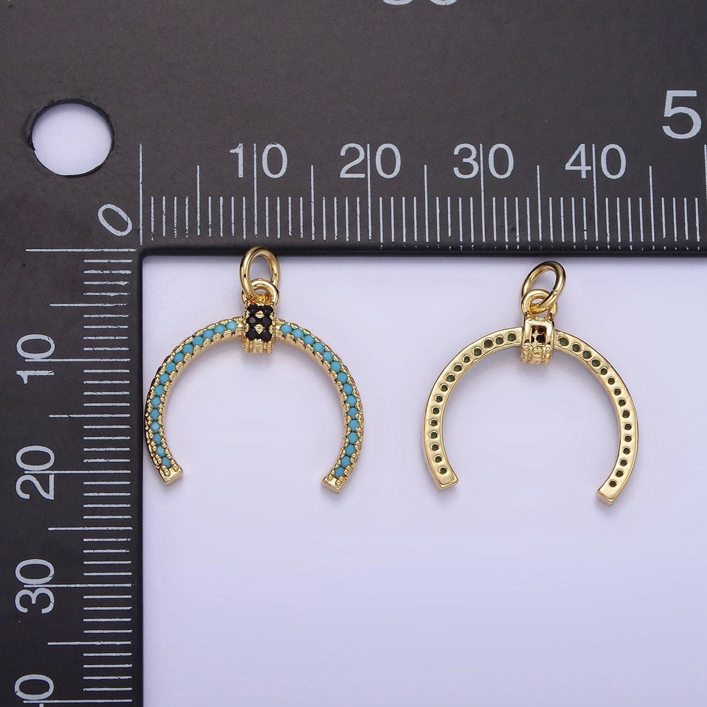 Double horn pendant with blue and black cubic zirconia 22mm | ag-634