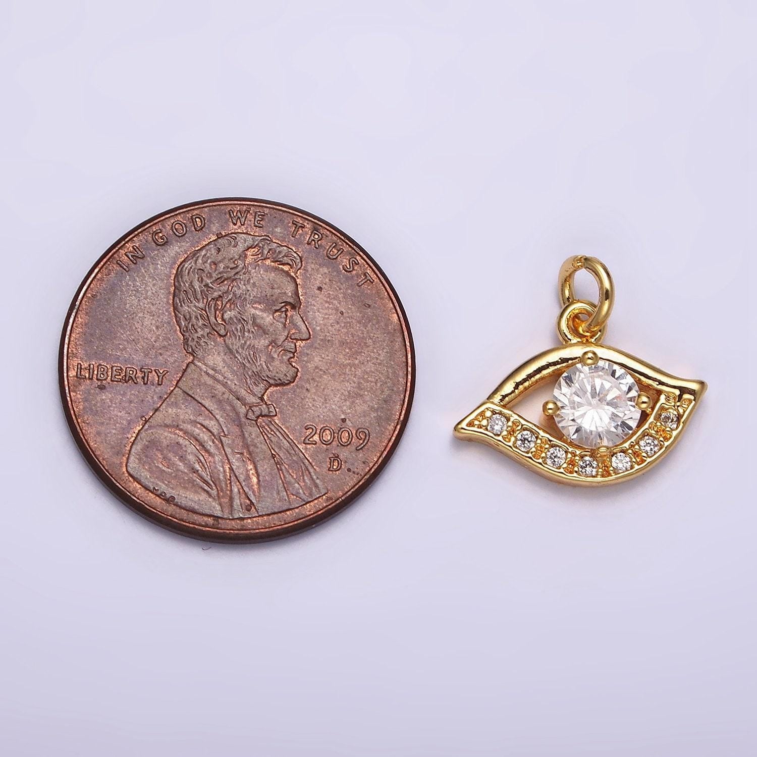 24k gold filled clear cz micro paved cz open evil eye of ra charm | ac871